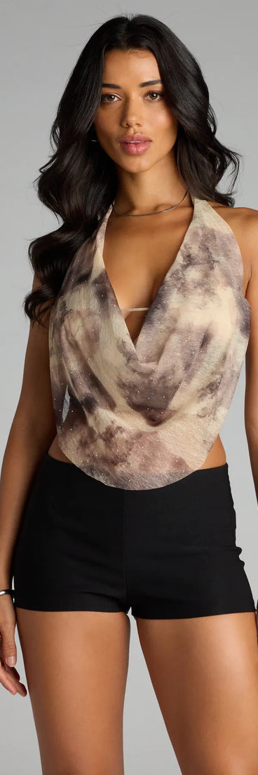 Complete your look with the Cosmic Crush Abstract Halter Top, a trendy taupe top that’s ready to pair with anything in your fall rotation.