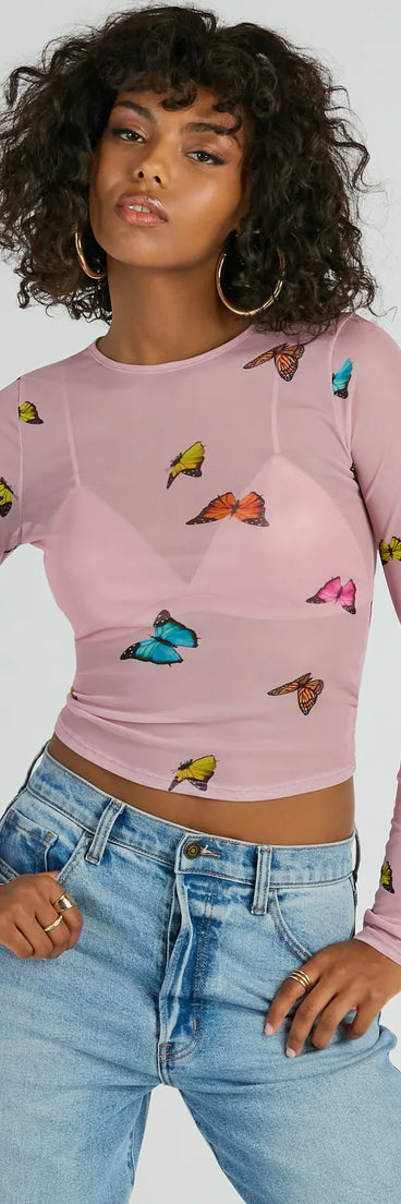 Whether fitted or flowy, the Butterfly Effect Long Sleeve Mesh Crop Top is a long-sleeve top that offers endless styling options as a layer or a standalone piece to elevate your outfit for the season.