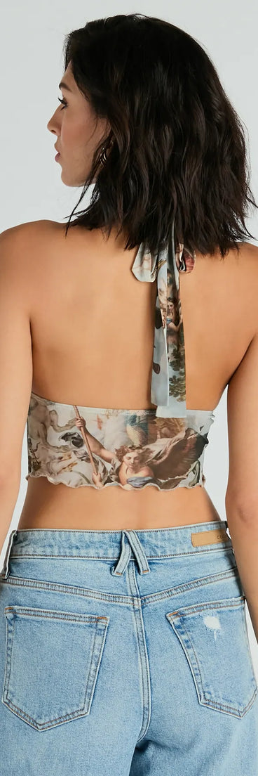 The party-ready Catch Your Eye Art Print Halter Crop Top is a multi-color going-out top showcasing a seasonal color and modern silhouette to create outfits for date nights, cocktail parties, or clubwear.