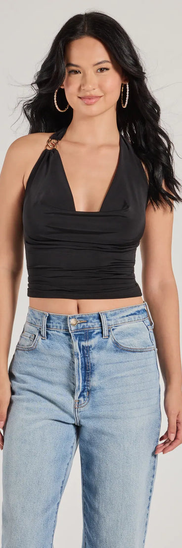 The Elevated Sleek Knit Cowl Neck Halter Top in black brings edge and energy to your vibe, ready to elevate any festival look or concert outfit.