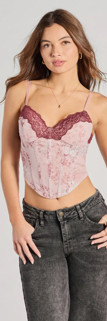 The Sweet And Sultry Floral Lace Mesh Bustier Top in pink with a modern design and trendy look is part of the latest women's tops collection to elevate your 2025 wardrobe.
