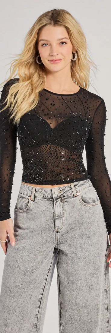 The Sheer Glitz Long Sleeve Beaded Rhinestone Crop Top in black with a modern design and trendy look is part of the latest women's tops collection to elevate your 2025 wardrobe.
