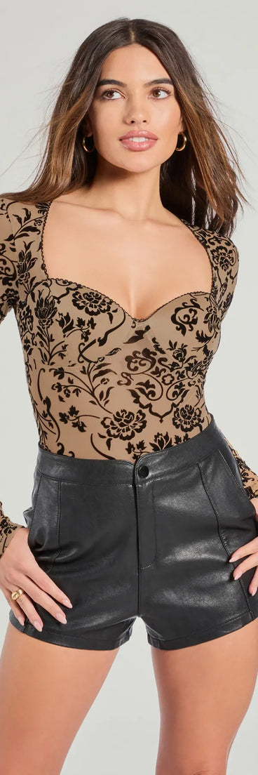 The Chic 'Fit Floral Flocked Velvet Long Sleeve Bodysuit in nude with a modern design and trendy look is part of the latest women's tops collection to elevate your 2025 wardrobe.