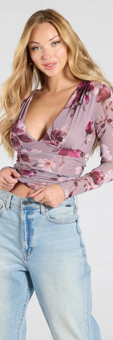 From bold to effortless, the Sassy Style Print Mesh Long Sleeve Top lets you define your vibe with mauve tops that speak your style.