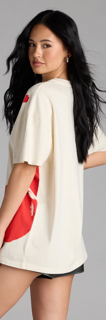 Perfect for layering or wearing solo, this short sleeve top features the Taste Like Cherries Oversized Graphic Tee in off-white for effortless everyday styling with jeans, cargos, or skirts.