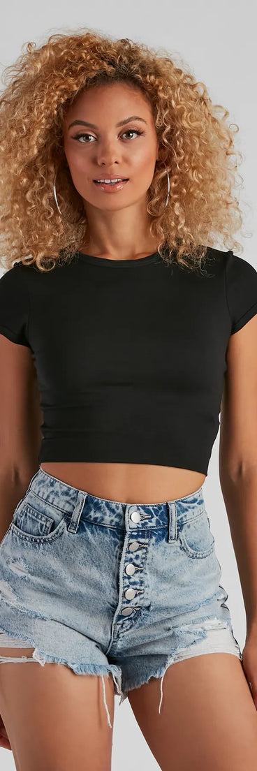 The Casual Must-Have Crew Neck Crop Top in black with a modern design and trendy look is part of the latest women's tops collection to elevate your 2025 wardrobe.