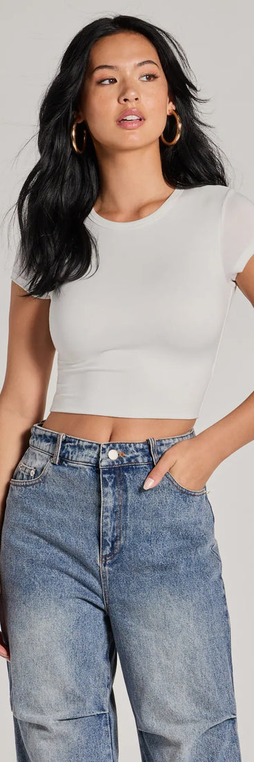 The Casual Must-Have Crew Neck Crop Top in ivory with a modern design and trendy look is part of the latest women's tops collection to elevate your 2025 wardrobe.