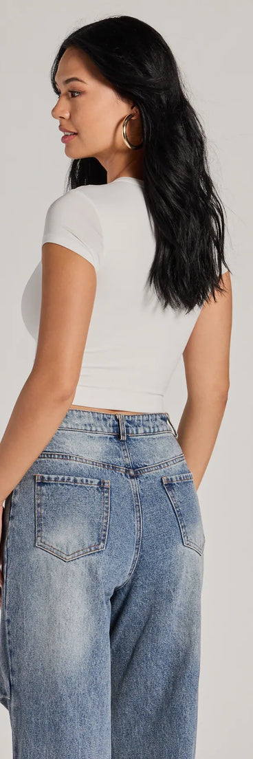 With its midriff cut and trend-forward fit, the Casual Must-Have Crew Neck Crop Top is a ivory crop top made to pair with skirts, denim, or whatever vibe you're feeling this season.