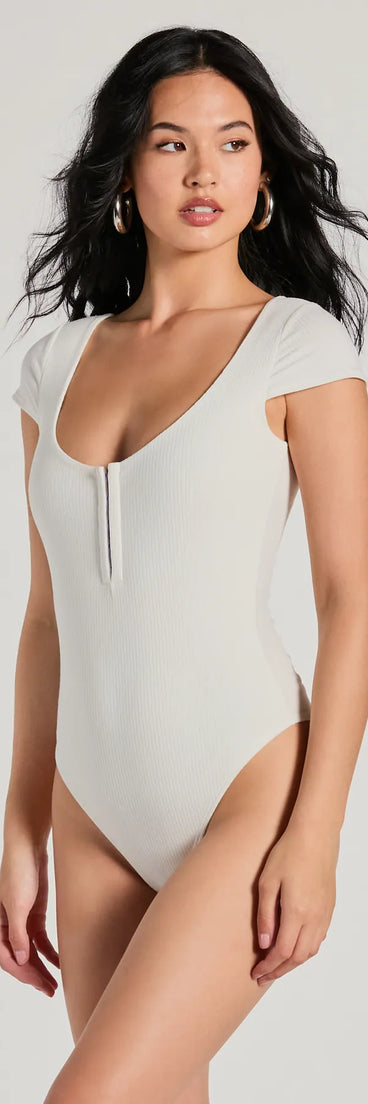 Elevate your winter outfits with the Trendy Vibe Hook And Eye Ribbed Knit Bodysuit, a white bodysuit designed for confident and effortless styling with anything from mini skirts to high-waist jeans.