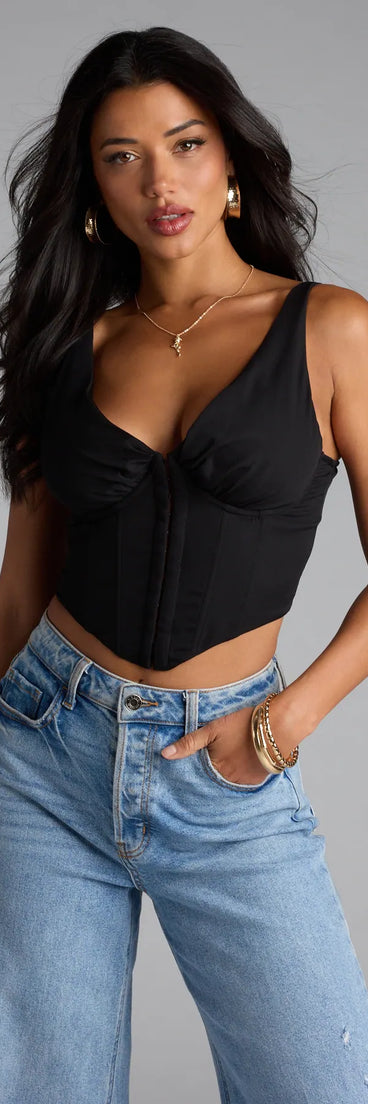For college campus looks, game day outfits, or a bold going-out vibe, the On Repeat V-Neck Corset Top is an on-trend black crop top that easily styles with your favorite denim.