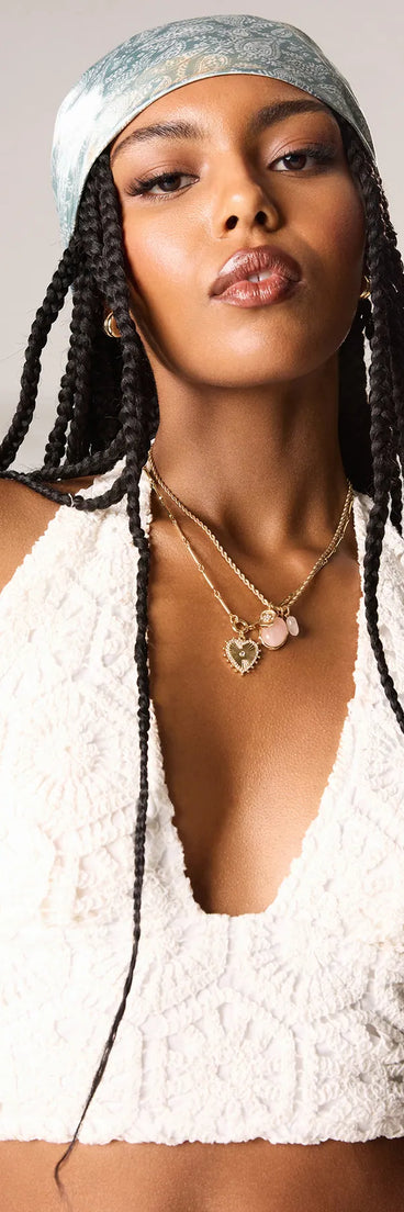 For college campus looks, game day outfits, or a bold going-out vibe, the Get The Look Crochet Halter Crop Top is an on-trend white crop top that easily styles with your favorite denim.