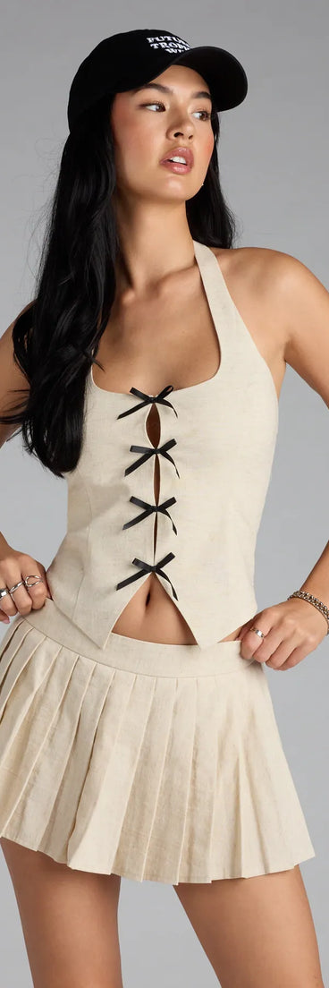 Look instantly put-together in the Adorably Chic Bow-Trim Linen Halter Top, part of a matching natural clothing set designed for chic, no-fuss fall outfits.