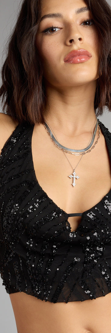 Trendy women’s tops, like the Own The Night Sequin Halter Top, bring effortless style for fall layering, lounging, or going out.