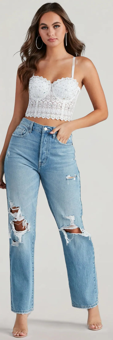 The Reigning Lace Bustier Top in white brings edge and energy to your vibe, ready to elevate any festival look or concert outfit.