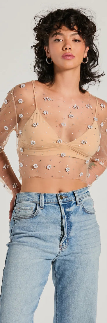 The Flirty Floral Rhinestone Pearl Sheer Mesh Crop Top in nude with a modern design and trendy look is part of the latest women's tops collection to elevate your 2025 wardrobe.