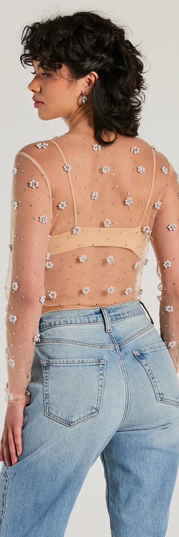 Stand out in 2025 in the Flirty Floral Rhinestone Pearl Sheer Mesh Crop Top, a women's nude long-sleeve top crafted from an elevated fabric with a modern neckline perfect for party outfits, bridal shower attire, or elevated casual outfits.