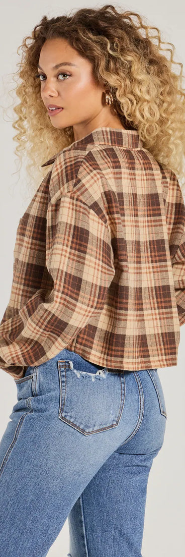 Stand out in 2025 in the Casual Act Button-Up Plaid Crop Top, a women's brown long-sleeve top crafted from an elevated fabric with a modern neckline perfect for party outfits, bridal shower attire, or elevated casual outfits.