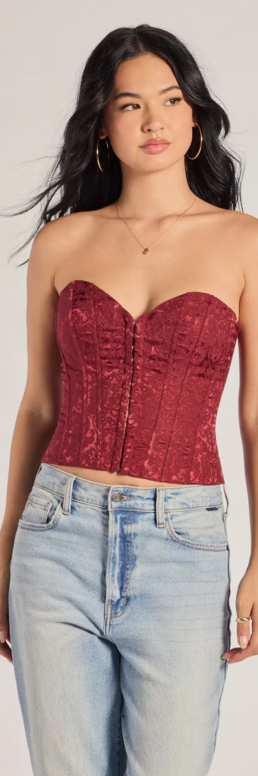 The Chic Status Brocade Satin Strapless Corset Top in burgundy with a modern design and trendy look is part of the latest women's tops collection to elevate your 2025 wardrobe.