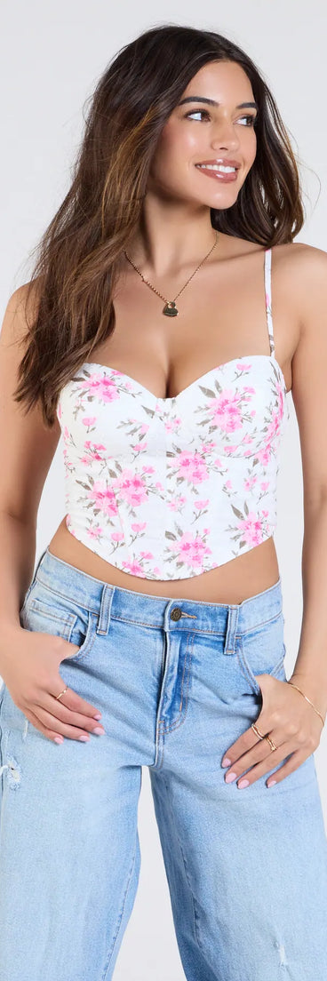 From bold to effortless, the Cheerful Blooms Floral Lace-Up Eyelet Bustier lets you define your vibe with white tops that speak your style.