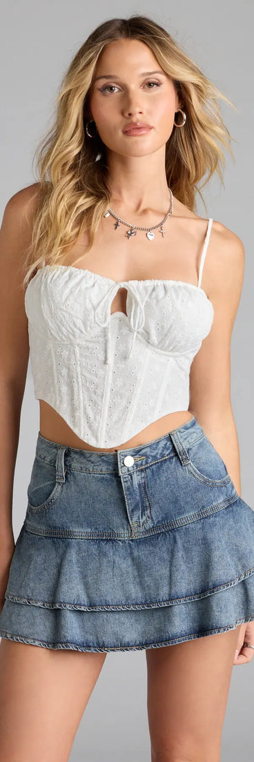 Add a seasonal refresh to your look with the Like A Love Song Eyelet Bustier, a trendy top in white made for easy styling for any vibe.