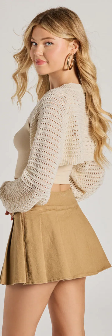 Wrap up in style with the Cozy Knit Long Sleeve Bolero, a cozy natural sweater for women designed for night-out looks, everyday outfits, or as a chic layering piece for the colder months.