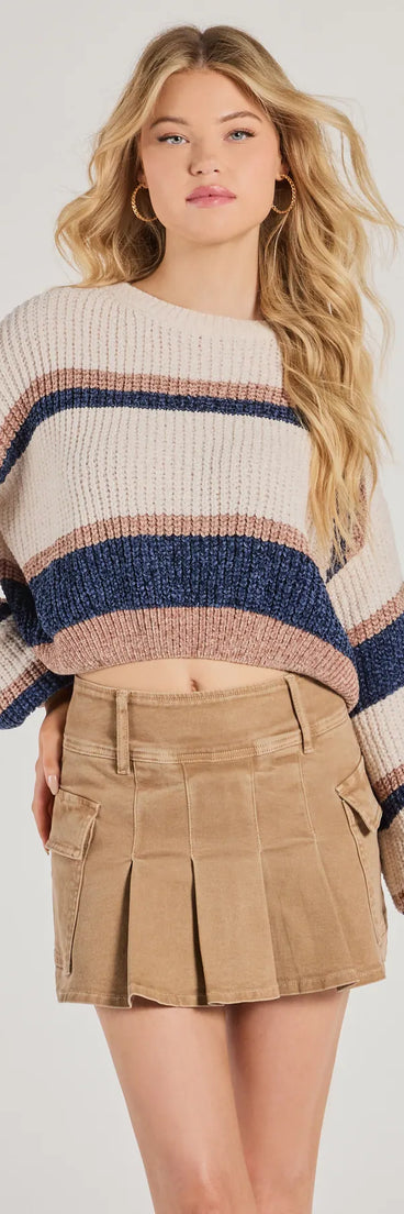 The Snuggly Chic Colorblock Striped Chenille Cropped Sweater in ivory with a modern design and trendy look is part of the latest women's tops collection to elevate your 2025 wardrobe.