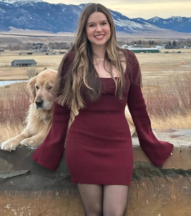 Make a statement in the Seasonal Staple Ribbed Knit Bell Sleeve Mini Dress, a plum bodycon dresses that blends unique design details with a tight silhouette for a head-turning holiday or New Year's eve dress.