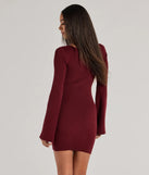 The Seasonal Staple Ribbed Knit Bell Sleeve Mini Dress is a plum dress, an essential holiday or NYE dress that pairs chic style with versatility making it perfect for cocktail events, New Year's Eve parties, or as a winter wedding guest look.