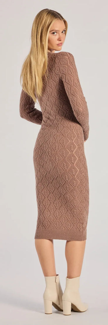 Revamp your 2025 wardrobe with this chic addition, the Stylish Embrace Cable Knit Midi Dress in mocha, perfect for elevating your style in the new year.