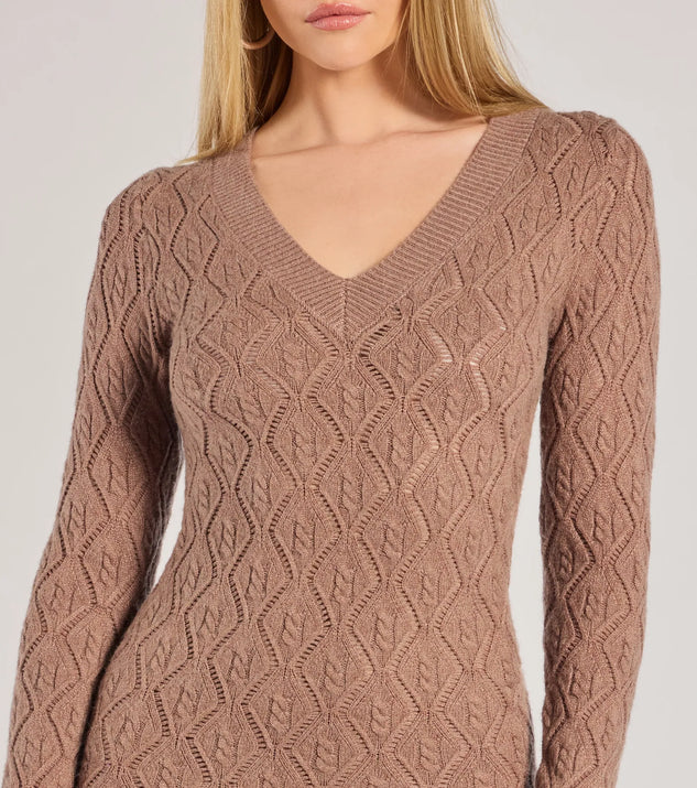 The Stylish Embrace Cable Knit Midi Dress is a mocha brown dress, an essential holiday or NYE dress that pairs chic style with versatility making it perfect for cocktail events, New Year's Eve parties, or as a winter wedding guest look.