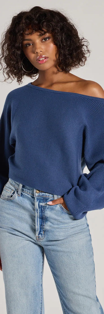 The Cozy Cutie Ribbed Knit Boat Neck Sweater in blue with a modern design and trendy look is part of the latest women's tops collection to elevate your 2025 wardrobe.