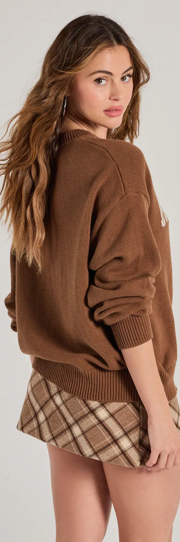 Layer-friendly So New York Oversized Pullover Sweater is a chic, transitional brown long-sleeve top with contemporary sleeves and neckline design, ideal for an elevated cozy style or casual elegance.