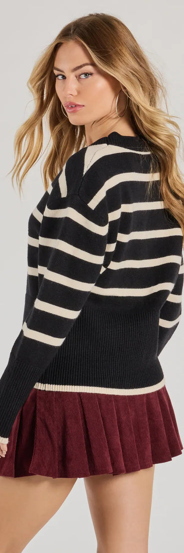 Layer-friendly Classic And Cozy Striped Knit Oversized Cardigan is a chic, transitional black long-sleeve top with contemporary sleeves and neckline design, ideal for an elevated cozy style or casual elegance.