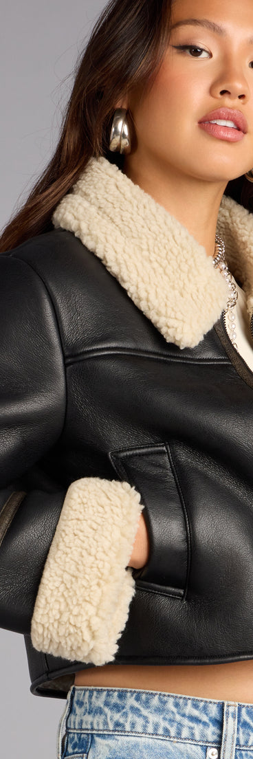 This black piece brings trend-right energy to the Downtown Girl Faux Leather Sherpa Crop Jacket, perfect for fall outfits that stand out.