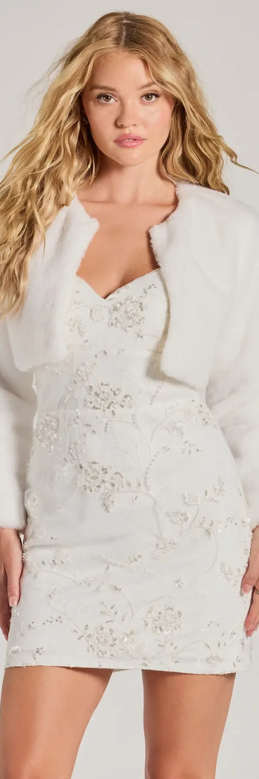 Stay chic this winter with Essential Faux Fur Bolero Jacket, a ivory women's coat perfect for layering. Featuring textured fabric and a trendy fit, this lightweight coat for women transitions effortlessly from cozy everyday wear to formal evening events.