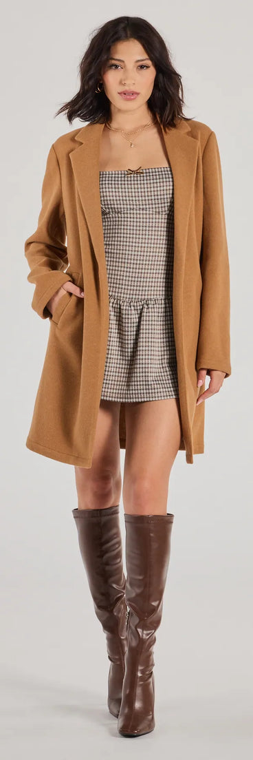 Stay chic this winter with Perfect Chic Faux Wool Trench Coat, a camel women's coat perfect for layering. Featuring textured fabric and a trendy fit, this lightweight coat for women transitions effortlessly from cozy everyday wear to formal evening events.