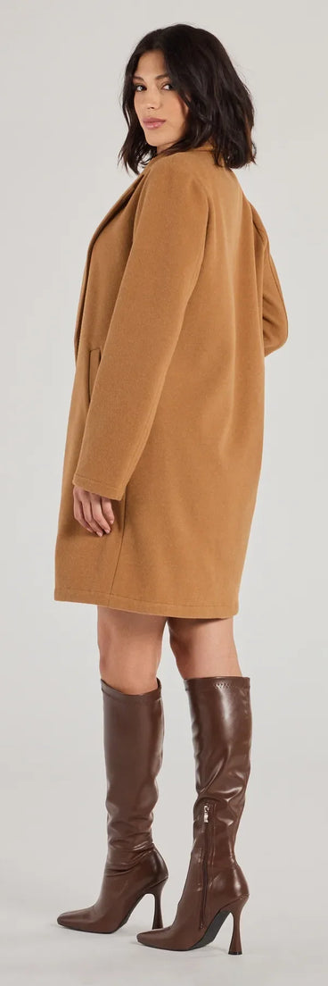 The Perfect Chic Faux Wool Trench Coat in camel is a women's workwear piece offering a trendy style and unique accents, perfect for effortlessly creating an outfit-of-the-day look that transitions your office look to going-out ready.