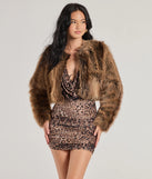 The Untamed Luxe Cropped Faux Fur Jacket in brown is a women's workwear essential with an elevated fabric and chic silhouette, ideal for layering and versatile enough to take your look from office chic to going-out ready!