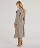 The Plaid Perfection Faux Wool Long Coat in natural is a women's workwear piece offering a trendy style and unique accents, perfect for effortlessly creating an outfit-of-the-day look that transitions your office look to going-out ready.