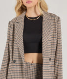 The Plaid Perfection Faux Wool Long Coat in natural is a women's workwear essential with an elevated fabric and chic silhouette, ideal for layering and versatile enough to take your look from office chic to going-out ready!