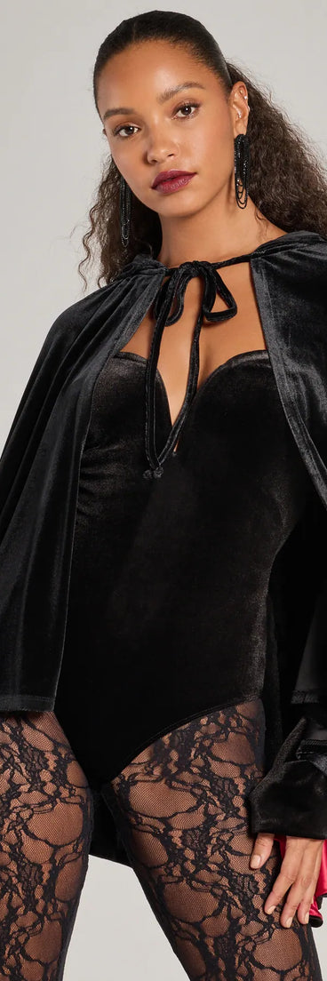 Upgrade your style game for 2025 with the Spooky And Sultry Velvet Hooded Cape in black, perfect for any fashion-forward wardrobe.