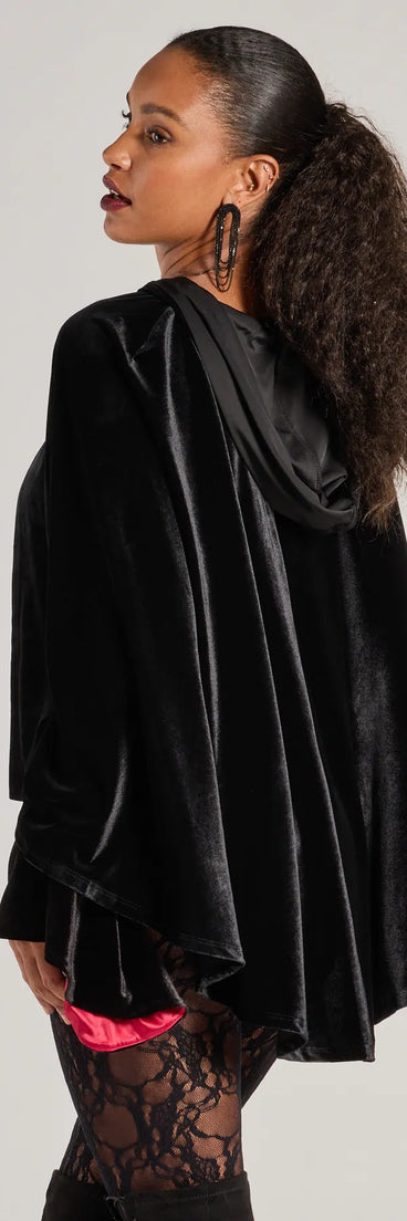 Upgrade your style game for 2025 with the Spooky And Sultry Velvet Hooded Cape in black, perfect for any fashion-forward wardrobe.