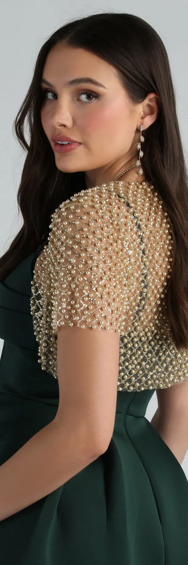 Add a polished layer to any look with the Layer On Glamour Faux Pearl Glitter Bolero in gold, the perfect blend of chic coverage and trend-forward style.