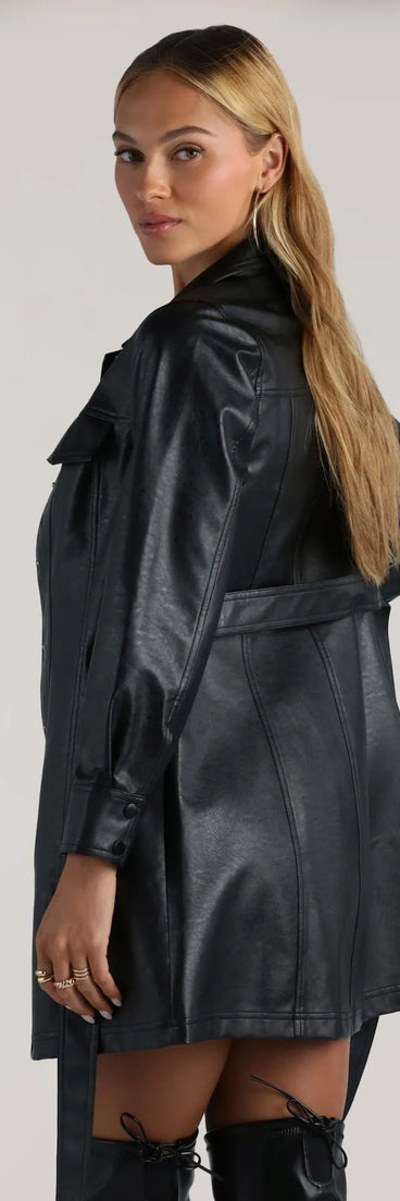 Bring statement edge with the Elevated Affair Faux Leather Trench Coat, a black faux leather jacket that adds sleek, trend-driven appeal to any dressy or casual outfit.