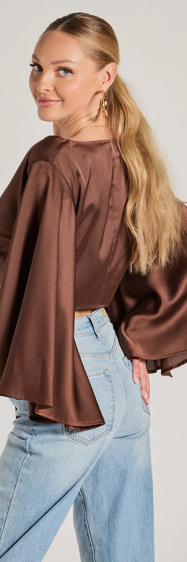With its midriff cut and trend-forward fit, the Silky Satin Tie Front Crop Top is a brown crop top made to pair with skirts, denim, or whatever vibe you're feeling this season.