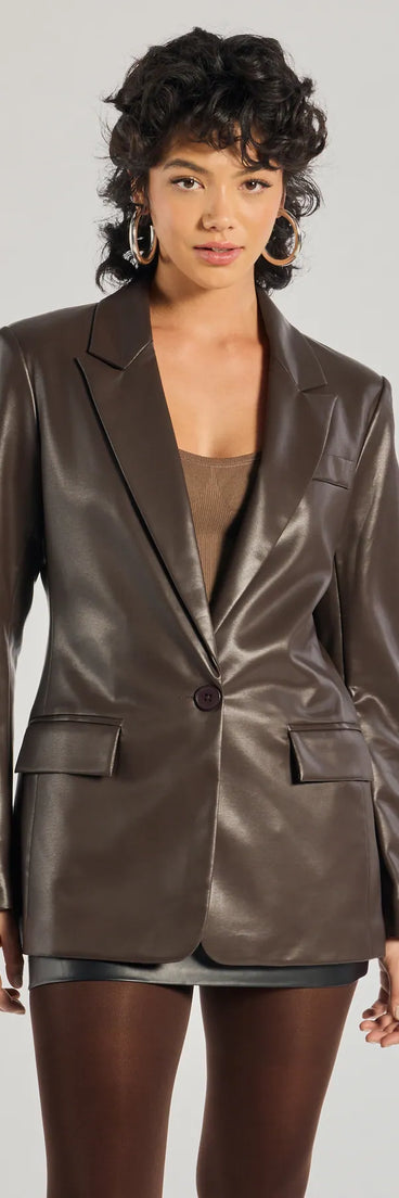 Top off your look with the Keep It Trendy Oversized Faux Leather Blazer, a brown blazer that adds sharp structure and polished edge to any outfit.