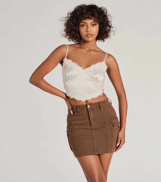 The Serving Style Cargo Mini Skirt is a brown cargo skirt, an effortlessly layer-friendly piece ideal for a holiday-ready look with a funtional-inspired flair.