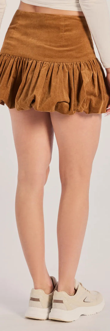 Designed for campus outfits, sleek workwear, and on-the-go moments, the Corduroy Chic Mid-Rise Bubble Skirt is a trendy tan bottom for women bringing effortless fall versatility.