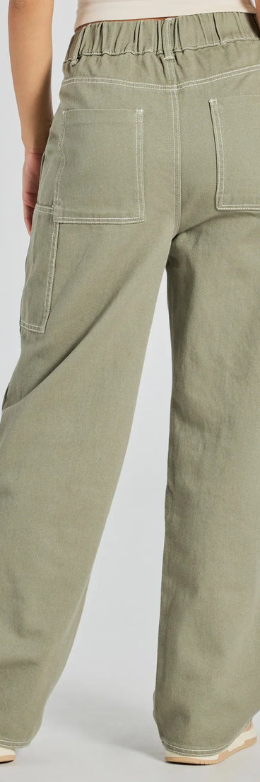 The Effortlessly Casual Wide-Leg Twill Cargo Pants in olive is a versatile pair of women's pants with trendy design accents, crafted for holiday-ready looks, from office wear to sophisticated winter night outs.