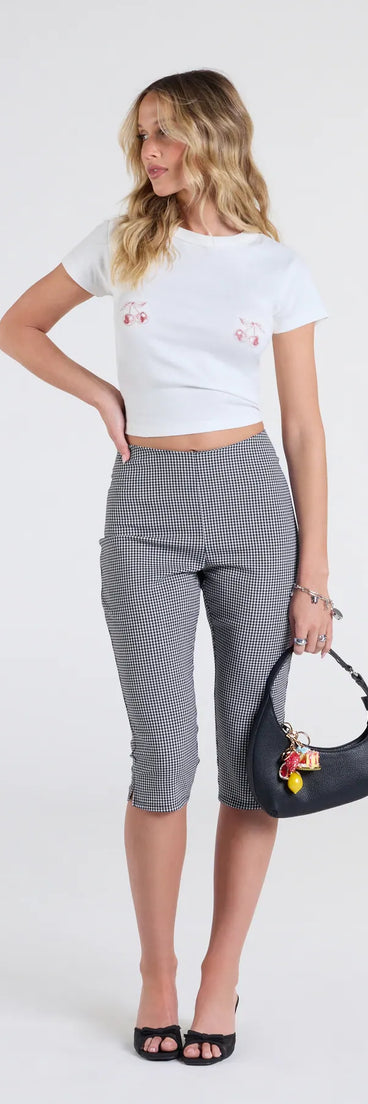 Pair the Stylish Strolls High-Rise Gingham Capri Pants with your favorite crop or bodysuit for effortless warm-weather looks with on-trend black pants that speak your style.